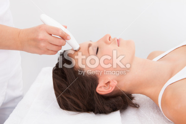 stock-photo-39543626-woman-under-going-microdermabrasion-treatment